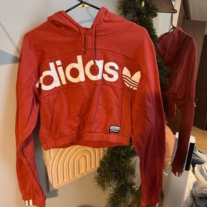 Adidas size medium have cropped sweatshirt.